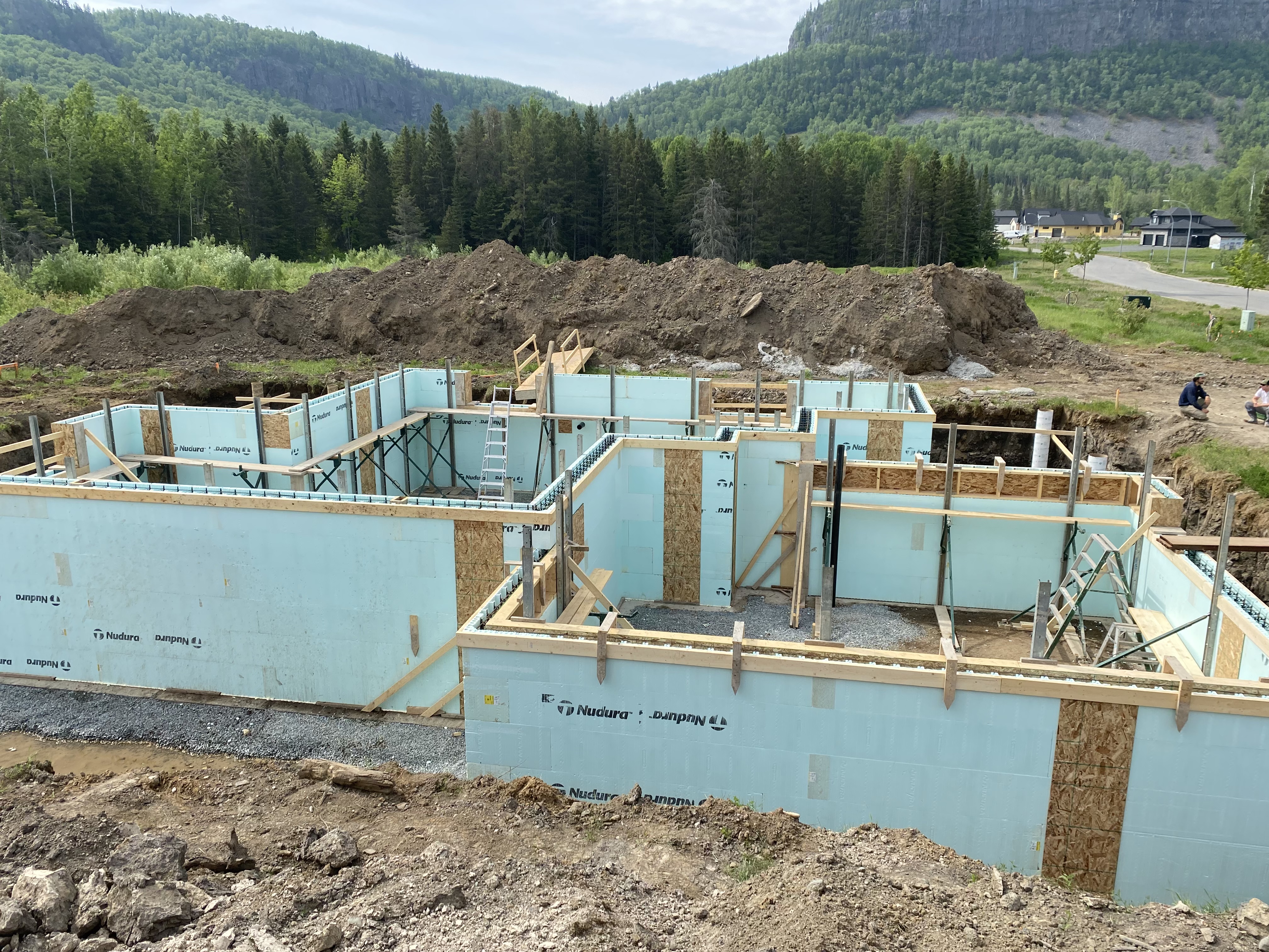 Nudura ICF walls braced for the pour with the escarpment behind the site