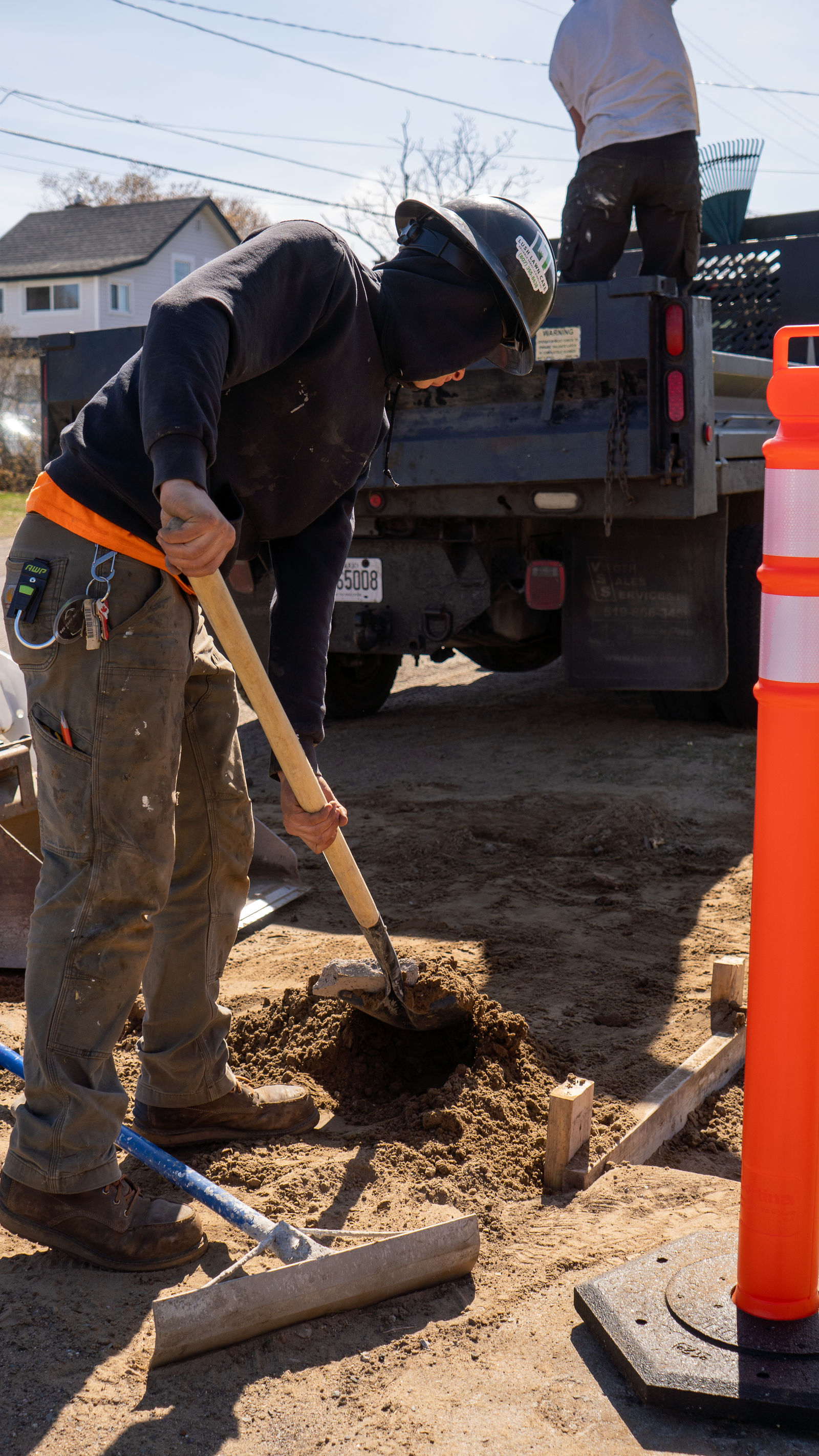 Trench work behind the traffic cone