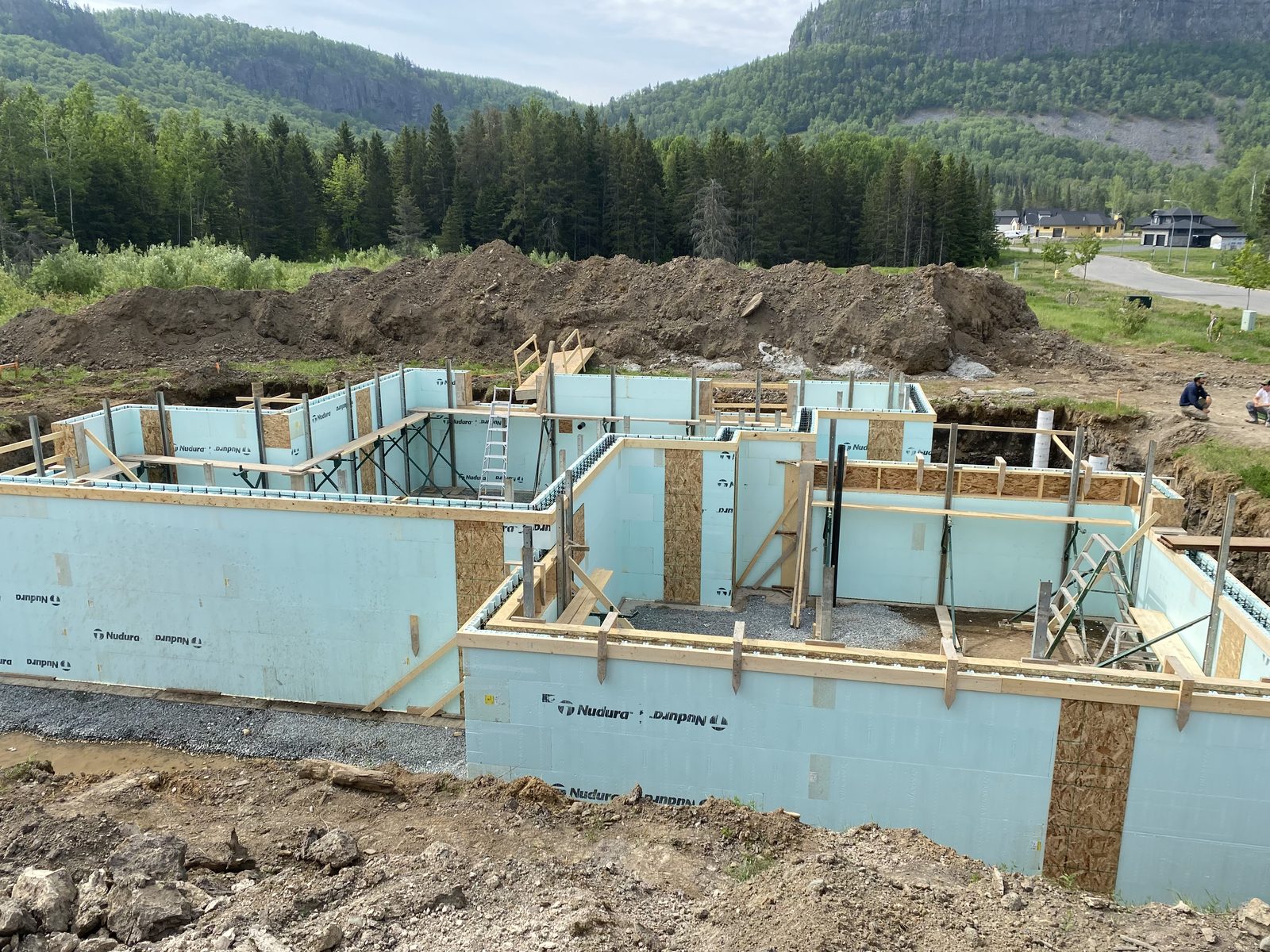 Nudura ICF walls braced for the pour with the escarpment behind the site