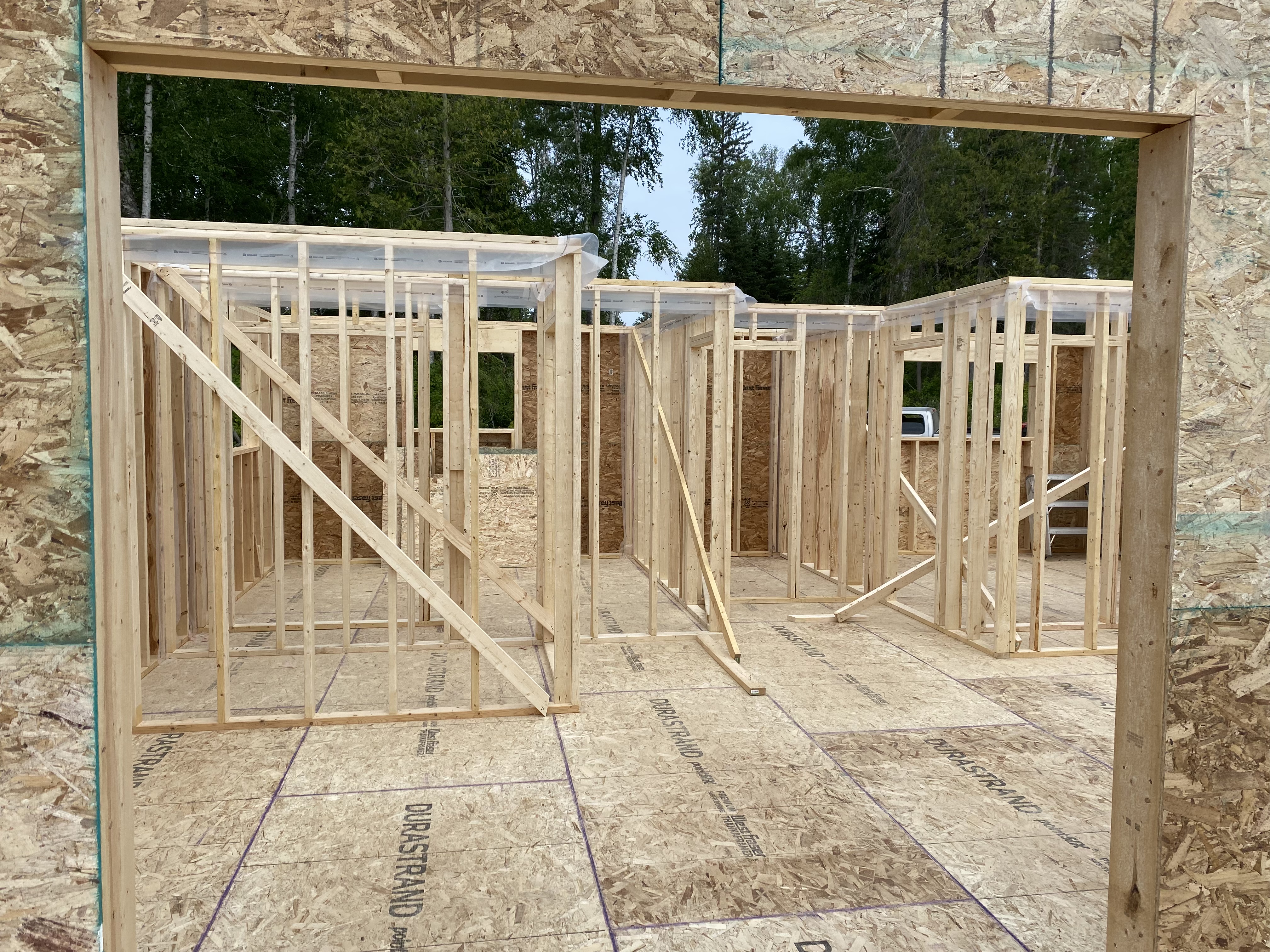 Interior framing with LVL beam opening up a two-storey volume